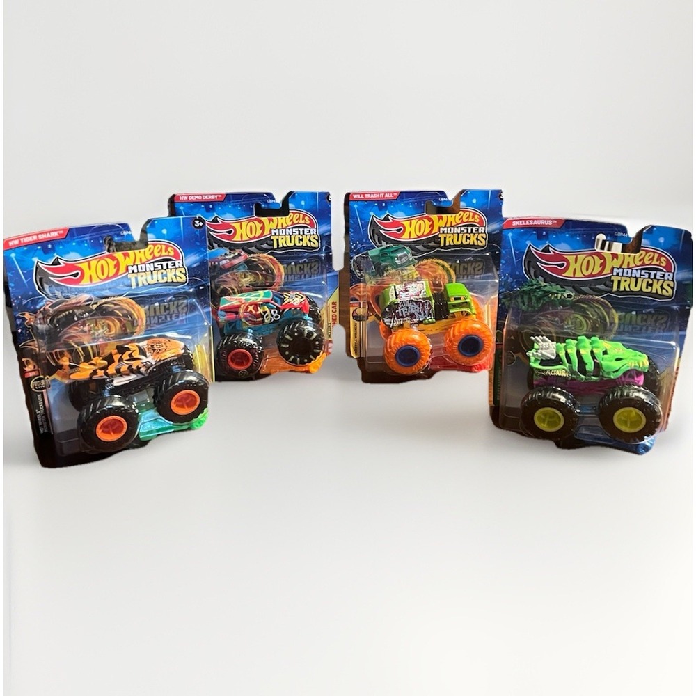 Hot Wheels Monster Trucks Lot of 4 - Skelesaurus, Tiger Shark, Demo Derby, Trash